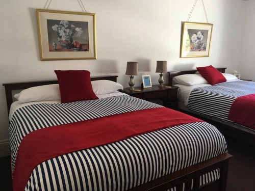 2 Queen beds - occupancy 1- 3  Magnolia room.