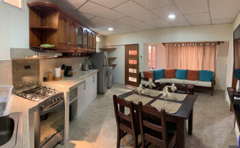 Living, dining, and kitchen area