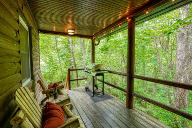 Outdoor deck with peaceful wooded views