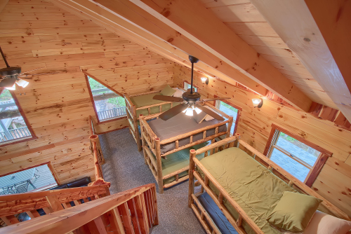 Looking down to 3 non-private Bunk Sets in Open Loft, Loft Level, from Upper Loft