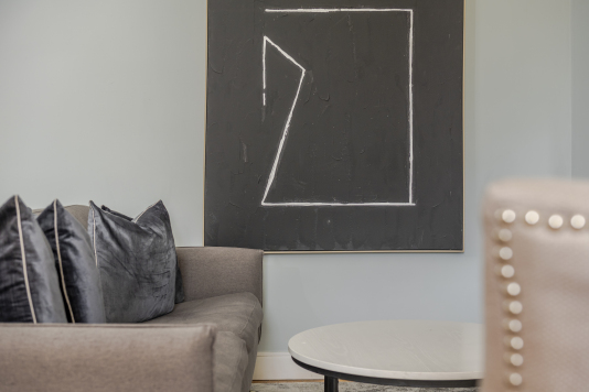 Experience refined comfort in this beautifully designed living room, where sophisticated décor meets effortless elegance. Flooded with natural light, the space features plush seating, stylish accents, and a statement centrepiece that elevates every moment. Perfect for relaxing or entertaining, this room delivers luxury living at its finest.