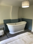 Bath in corner of Bedroom 1