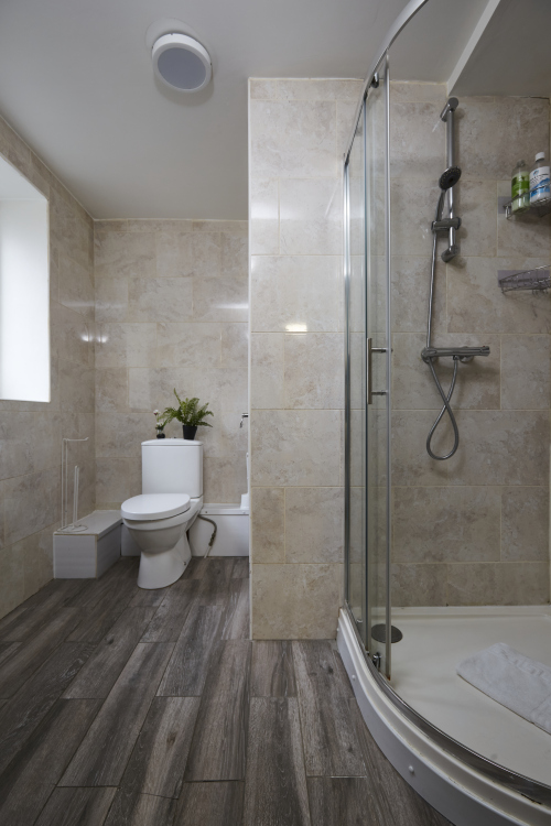 Bright bathroom with essential amenities for a pleasant stay