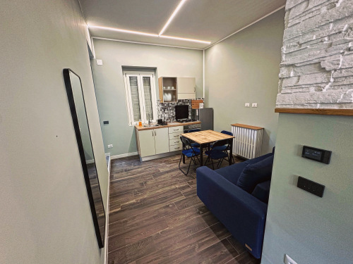 Zona giorno con cucina - Suite Deluxe