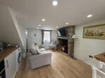 Cosy livingroom with log burner
