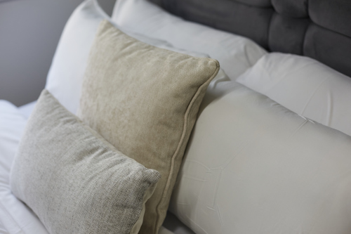 Comfortable bed with plush pillows and crisp, fresh linens for a restful night’s sleep.