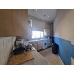 This photo represents the kitchen inside the flat