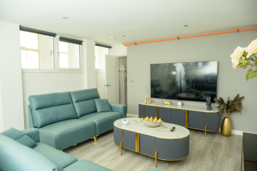 Spacious living room ideal for lounging, socialising, or enjoying a quiet evening.