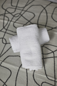 Settle into this serene double bedroom — a peaceful space to recharge.