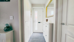 The entrance of this 4-bedroom house has been designed with convenience in mind. A ground floor toilet is located just off the hallway, while the living room and kitchen are immediately accessible—perfect for groups who want to settle in without delay