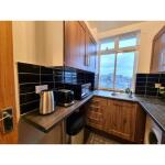 This photo represent the kitchen of the property. 