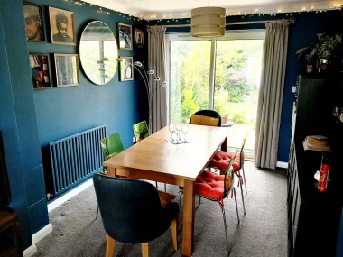 Dining table and 6 chairs with beautiful view of the garden.
