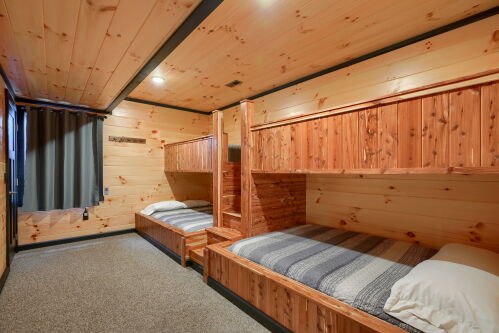 30-Lower level bunk room with 2 queen beds and 2 twin beds
