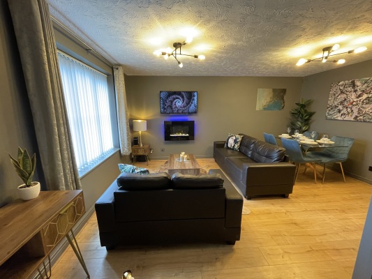 Open plan living dining room with dedicated work space