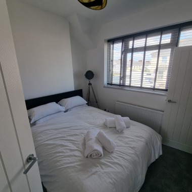 King size bedroom with TV