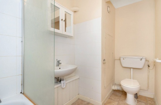 Shared bathroom toilet & basin