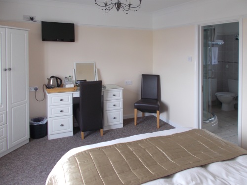 Carlyon, with guest tray, Freeview TV, and en-suite.