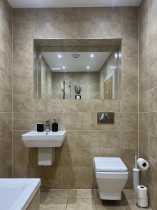 Bright bathroom featuring modern fixtures and fittings.