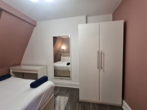 This photo represents bedroom 3 inside the property