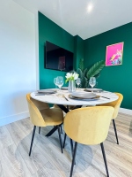 Dining area with dinnerware for four.