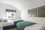 Bright and airy bedroom designed for comfort, style, and ultimate relaxation.