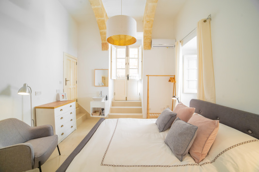 bedroom with ensuite shower