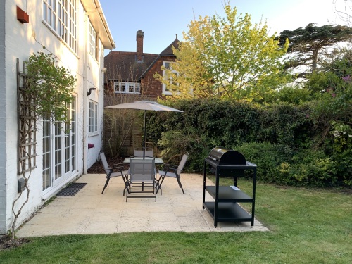 Patio doors open out on to the terrace and rear garden.
