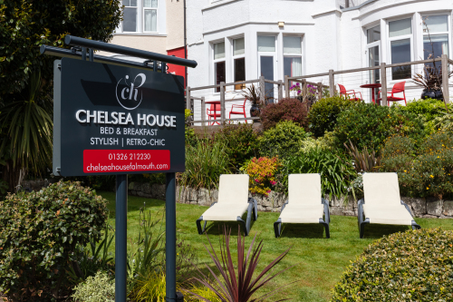 Chelsea House, sun loungers and garden