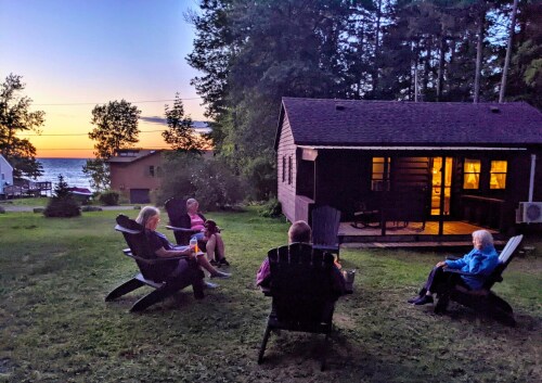 View from the fire pit.  Waterfront access 3min. walk.   There is also a great back porch and you back to a state park!  Hike right out the trails.  AND your near a port town w/sandy public beach, ice cream, resturants w/decks on the water & more!