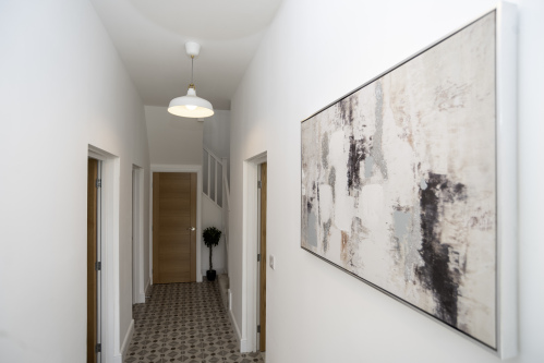 Large Bright Entrance - An open, airy hallway that makes every arrival feel inviting and stress-free