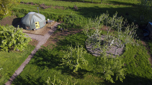 Aerial image of Cai Yurt with private outdoor shower