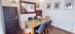 Spacious dining room adjoins kitchen. Dining table with 6 chairs plus all essentials that you will need for you stay. 