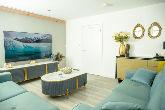 Relax in this comfortable living room, perfect for unwinding after a busy day.