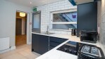 A Bright Modern Fitted Kitchen. You will find all you need for those intimate meals you decide to stay in fand cook. 