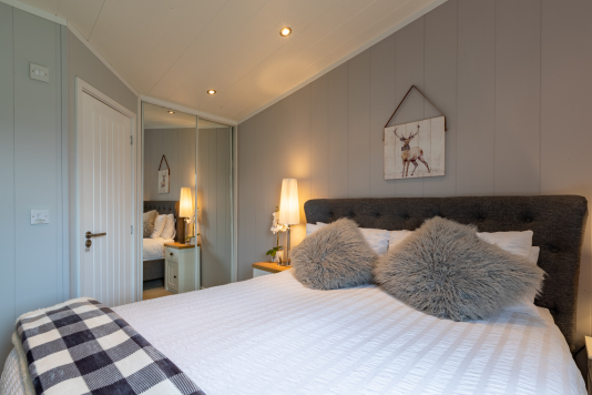 Master bedroom with comfortable king size bed