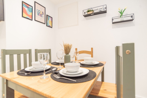 Dining space set for six, perfect for shared meals together.