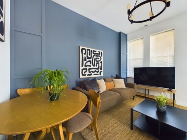 Wake up and roll out a yoga mat under the natural light for mindful meditations, or turn on the 50-inch TV for a relaxing morning. This serene space invites you to start your day with intention or unwind in calm simplicity.