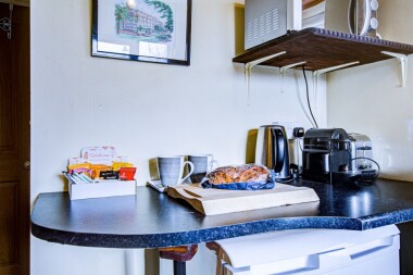 Microwave, fridge freezer, toaster and coffee machine