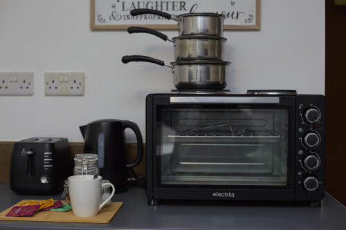 Fully Equipped Kitchen – Cook Just Like Home