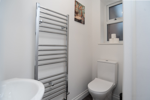 Convenient downstairs WC — clean, modern and ideal for easy access during your stay.