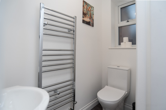 Convenient downstairs WC — clean, modern and ideal for easy access during your stay.