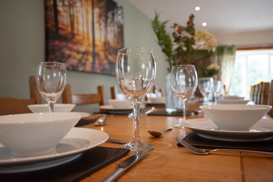 Enjoy our huge kitchen diner, complete with table to seat 20! Kitchen Island, space to unwind and enjoy get togethers with your friends, multigeneration stays, or for work purposes, whatever guest you are, The Barn is just perfect