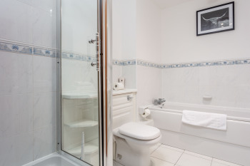 Each apartment at Turnberry has an additional bathroom with walk in shower - small step and separate bath. 