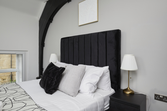 A comfortable double bedroom offering the perfect blend of comfort and simplicity.