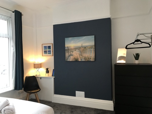 Bedroom One - With Wardrobe rail and chest of draws