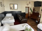 Spacious with 2 single beds and a double bed.