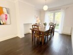 Gather around the elegant dining table, seating six guests in comfort. With stylish décor and a warm ambiance, it’s the perfect setting for shared meals and special moments.