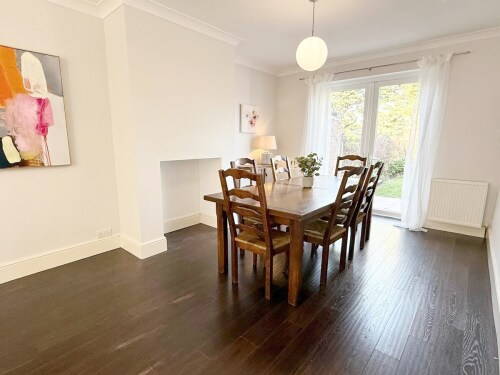 Gather around the elegant dining table, seating six guests in comfort. With stylish décor and a warm ambiance, it’s the perfect setting for shared meals and special moments.