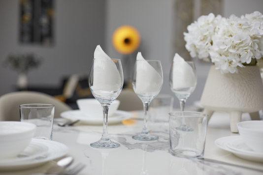 Well-appointed kitchen with essential appliances and ample workspace.