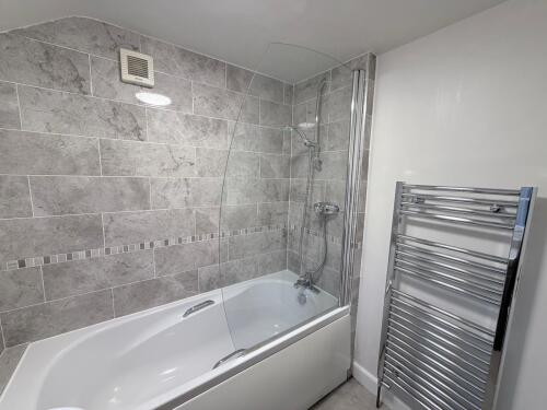 Full bathroom with bath & shower